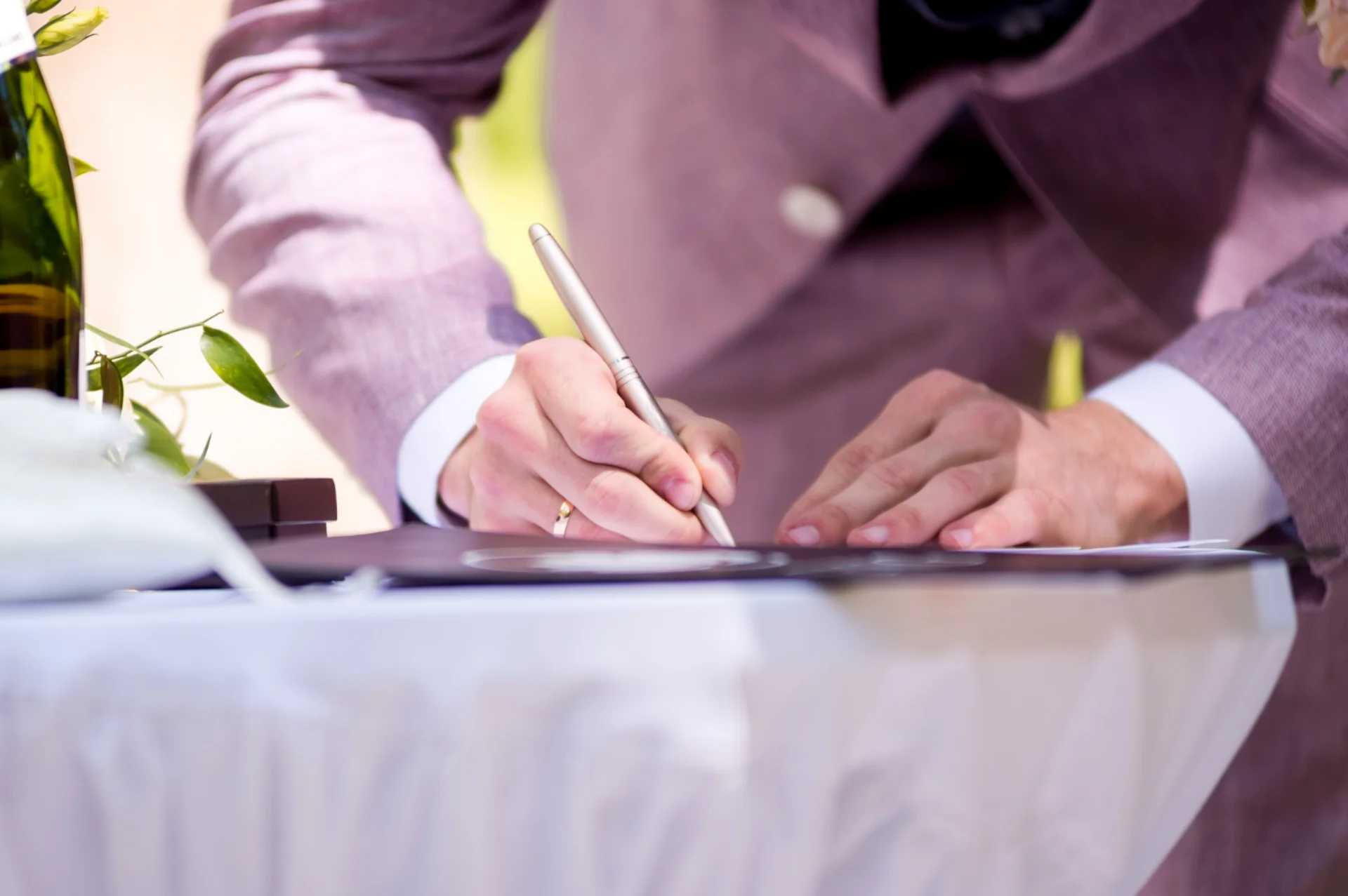 groom-signing-marriage-license-signature-ceremony-wedding-tradition Functional Medicine Los Angeles
